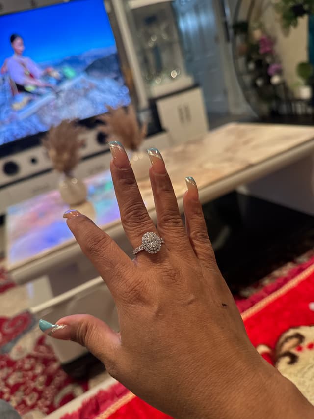 Halo engagement ring - AI says Real