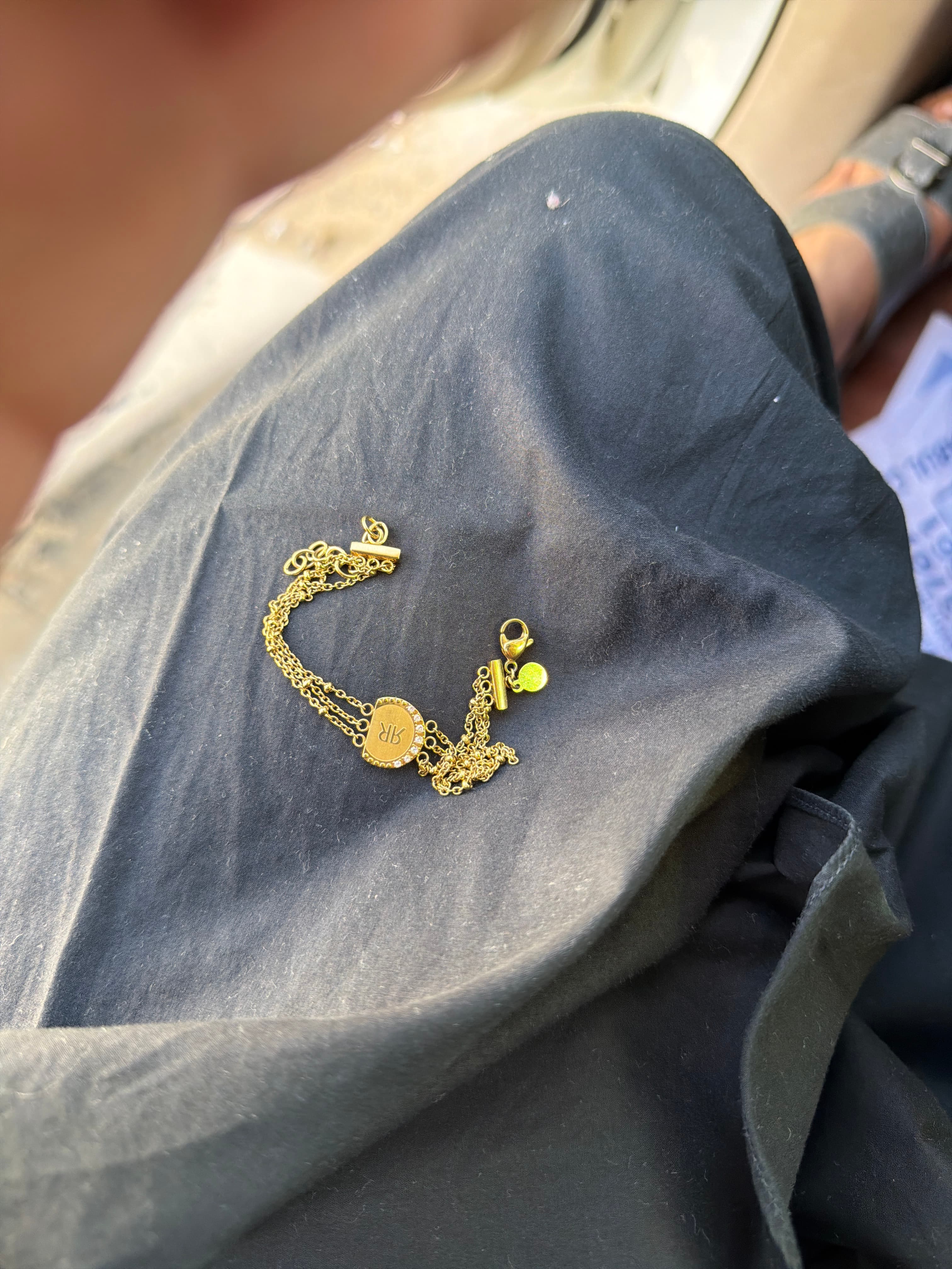 Gold-tone chain bracelet with 'AR' monogram charm - AI says Real - Image 1