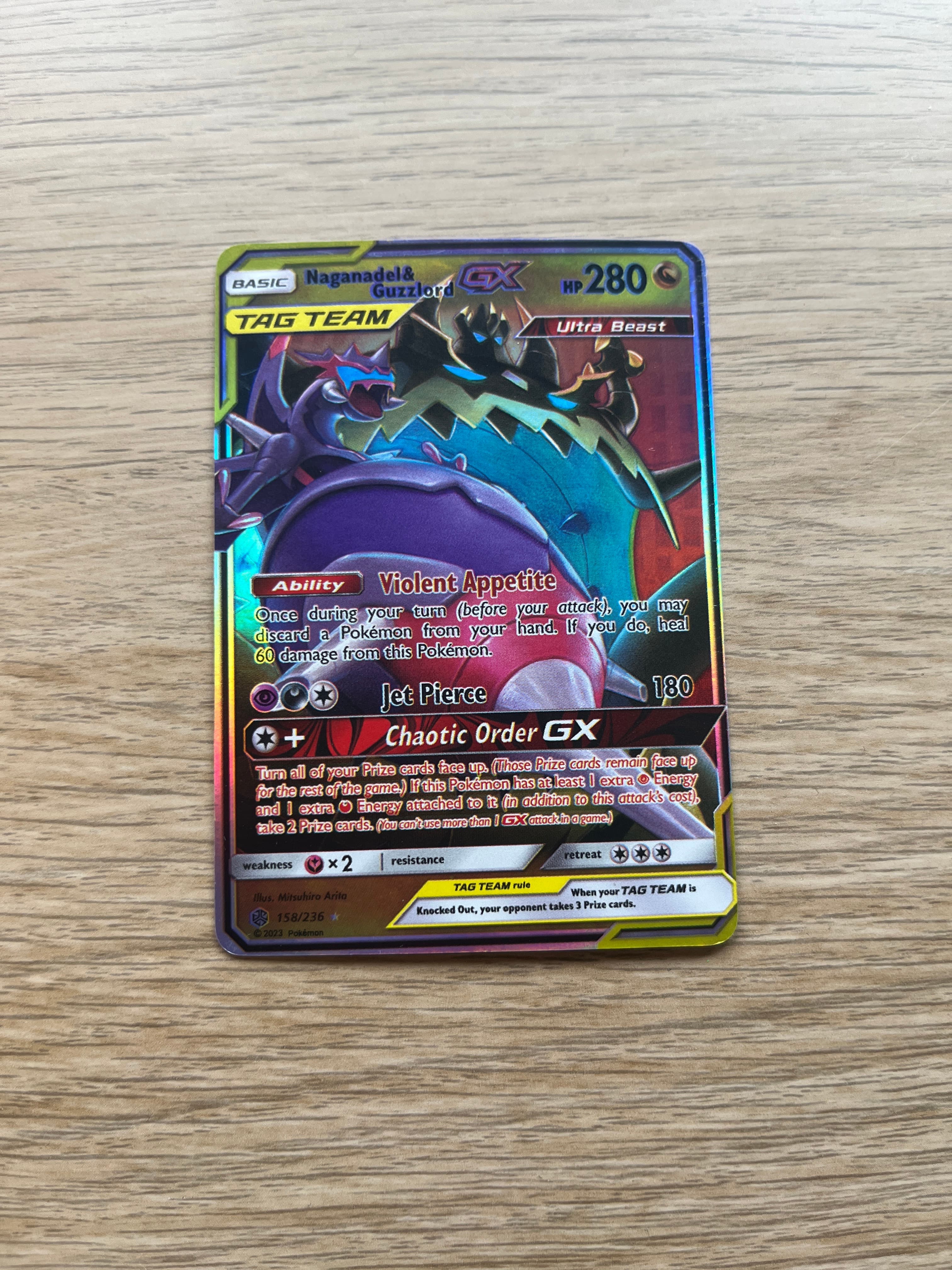 Pokémon TCG - Naganadel & Guzzlord GX Tag Team (158/236) - Cosmic Eclipse - AI says Fake - Image 1