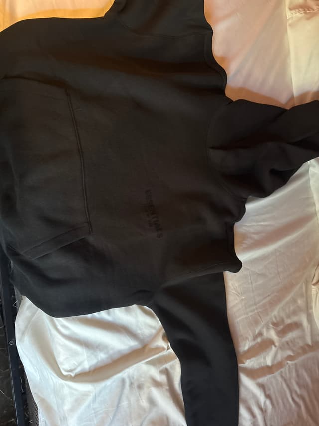 Fear of God Essentials black pullover hoodie - AI says Real