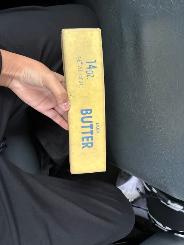 14 oz (400 g) salted butter block, brand not visible - AI says Real