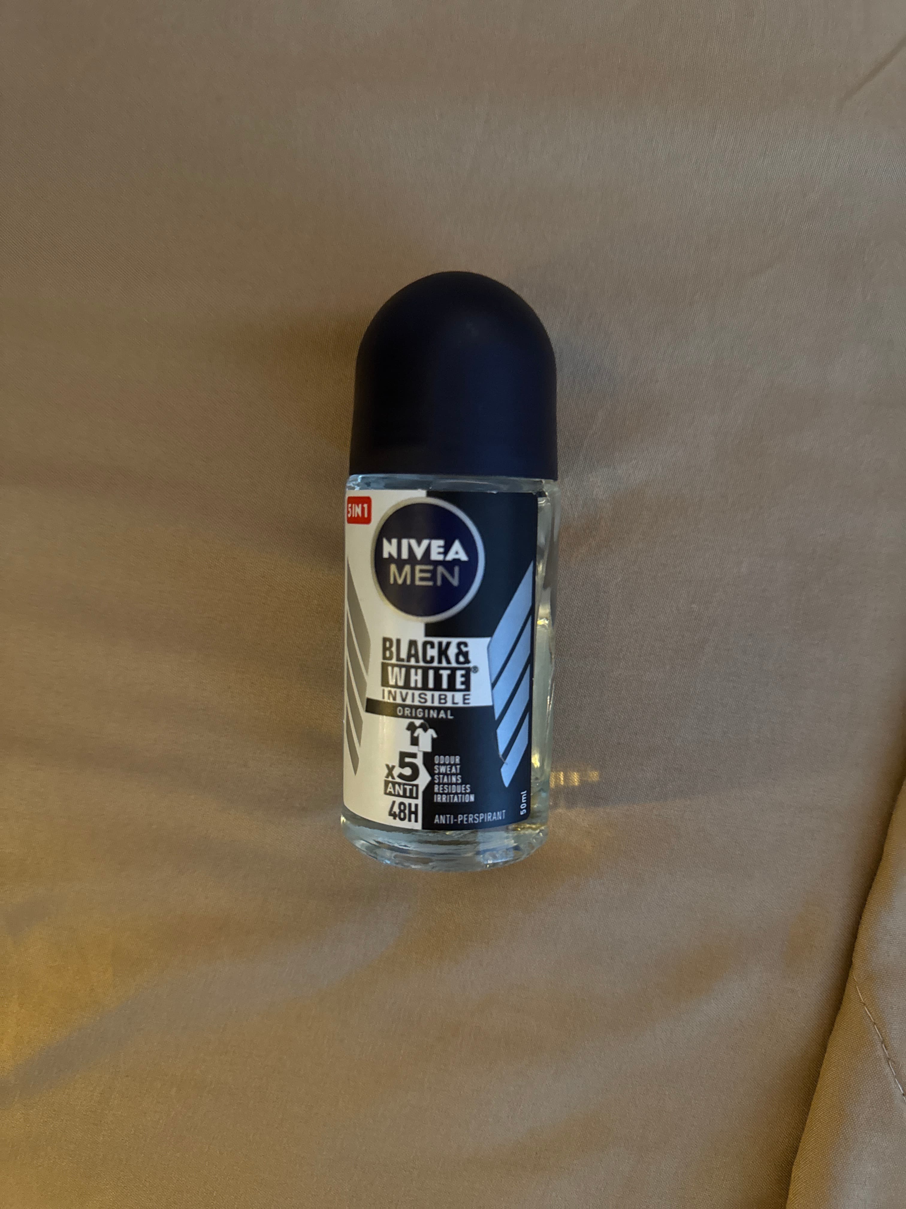 Nivea Men Black & White Invisible Original Anti-Perspirant Roll-On (50ml) - AI says Real - Image 1