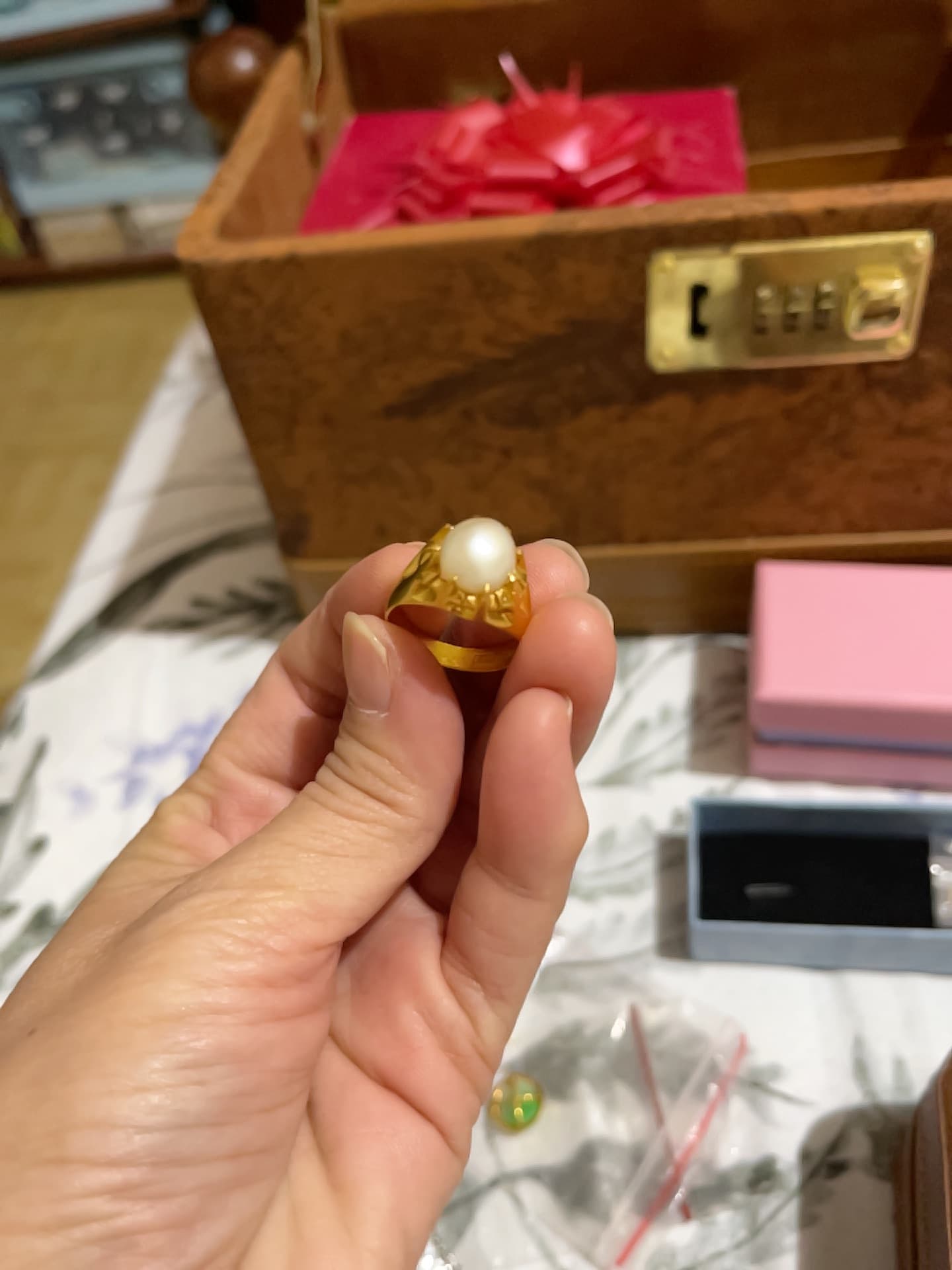 Gold-tone ring with a large white pearl-style cabochon - AI says Real - Image 1
