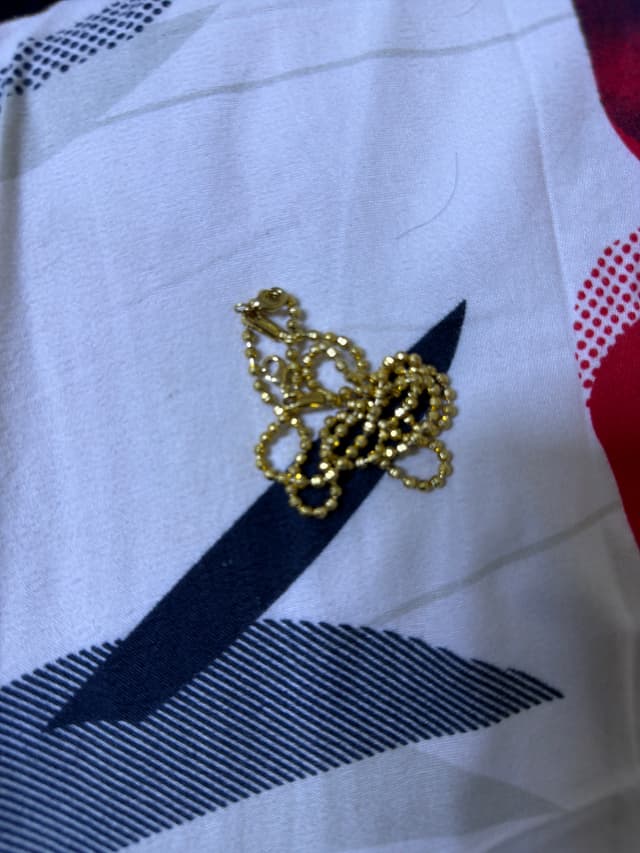 Gold-tone beaded chain necklace and ring - AI says Real