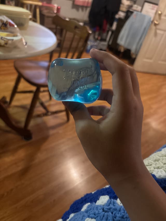 Wheaton, N.J. blue glass miniature collectible bottle (vintage-style reproduction) - AI says Real