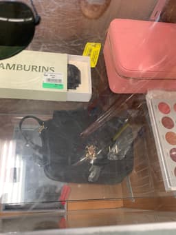 Ray-Ban Aviator Sunglasses (found at Goodwill Thrift Store, priced $30.50) - AI says Fake