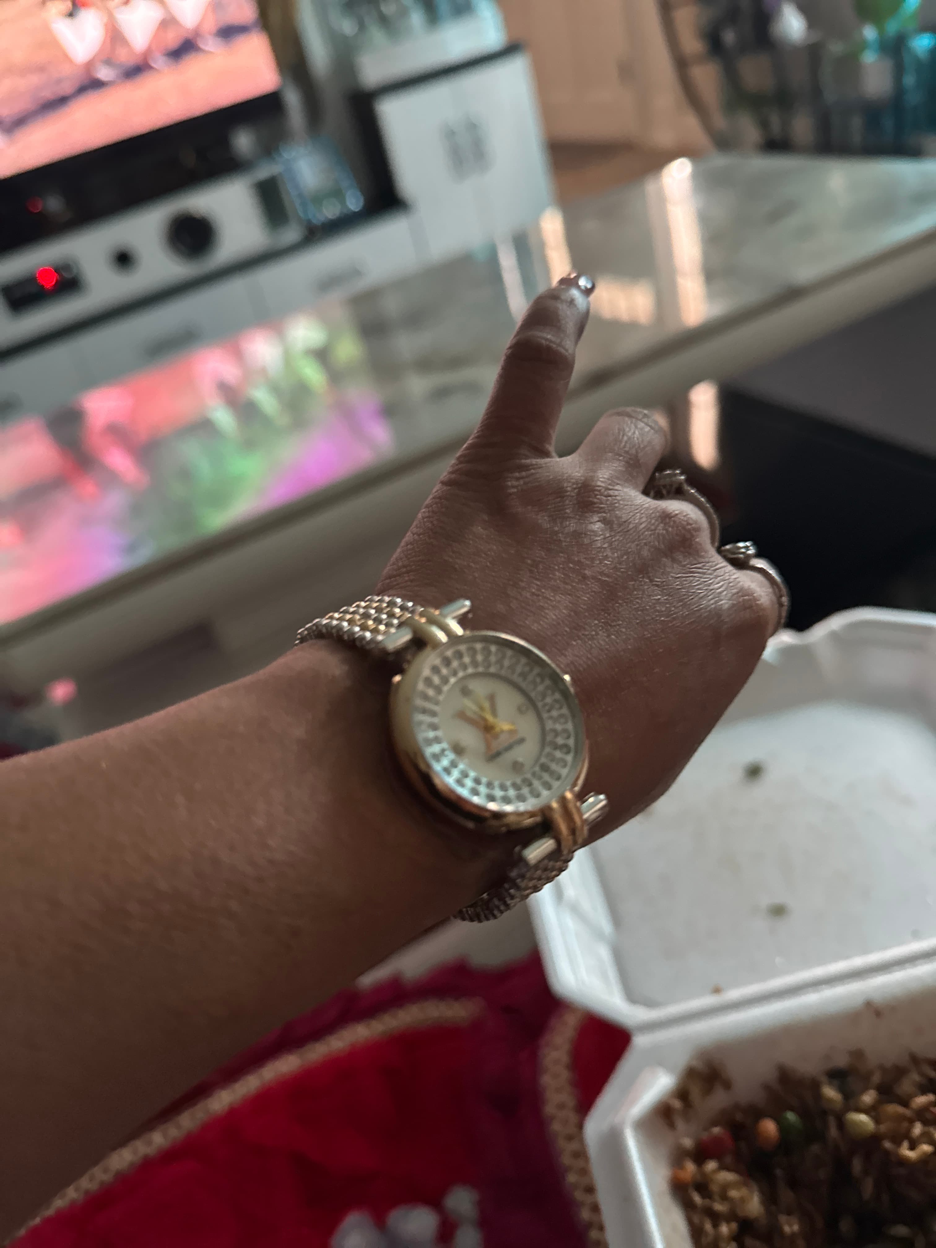 Louis Vuitton branded wristwatch - AI says Fake - Image 1