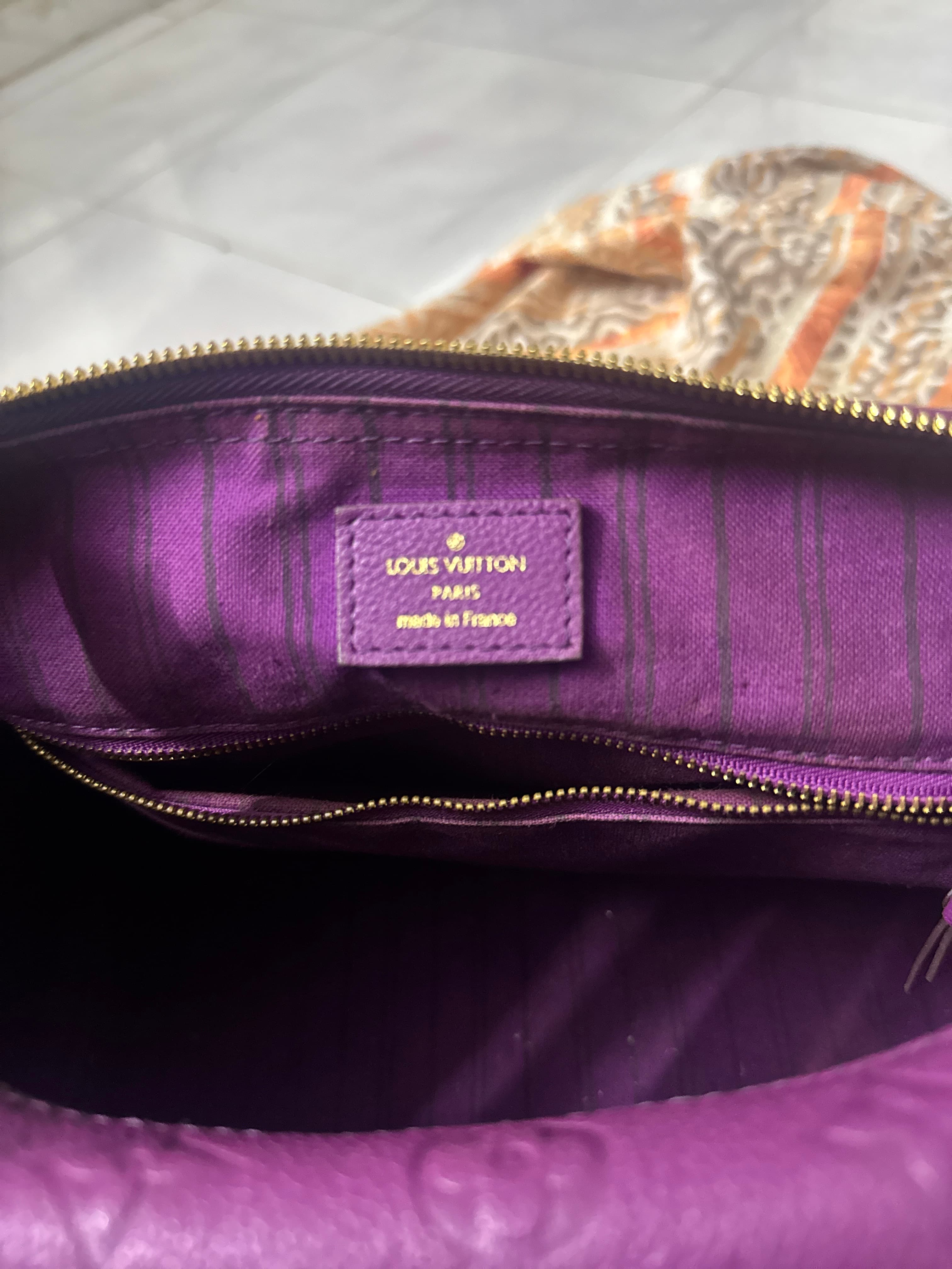 Louis Vuitton Monogram Empreinte Leather Bag (Purple) with Bandoulière Strap - AI says Fake - Image 1