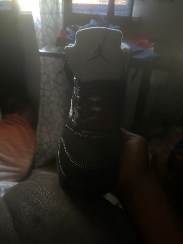 Black designer high-top sneaker with side zipper, possibly a Rick Owens Geobasket or similar model - AI says Real
