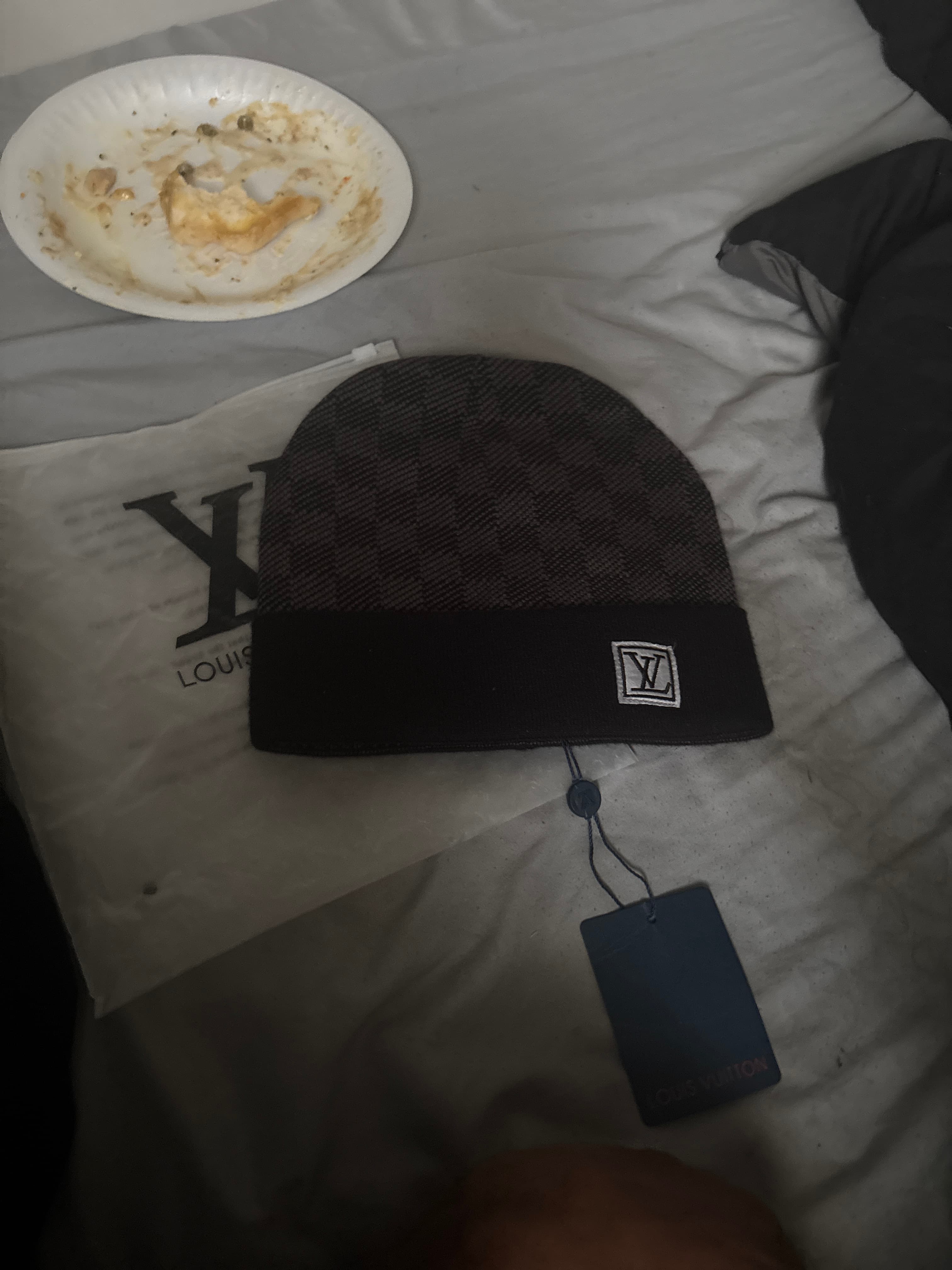 Louis Vuitton two-tone knit beanie with embroidered LV patch - AI says Fake - Image 1