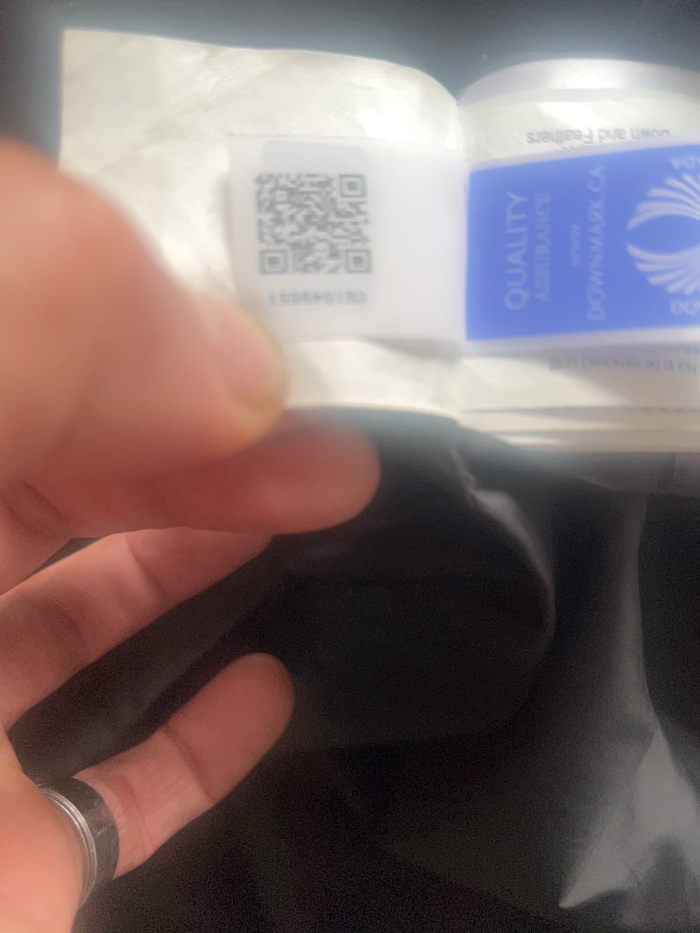 Down and Feathers Product with Downmark Canada Quality Assurance Label - AI says Real - Image 1