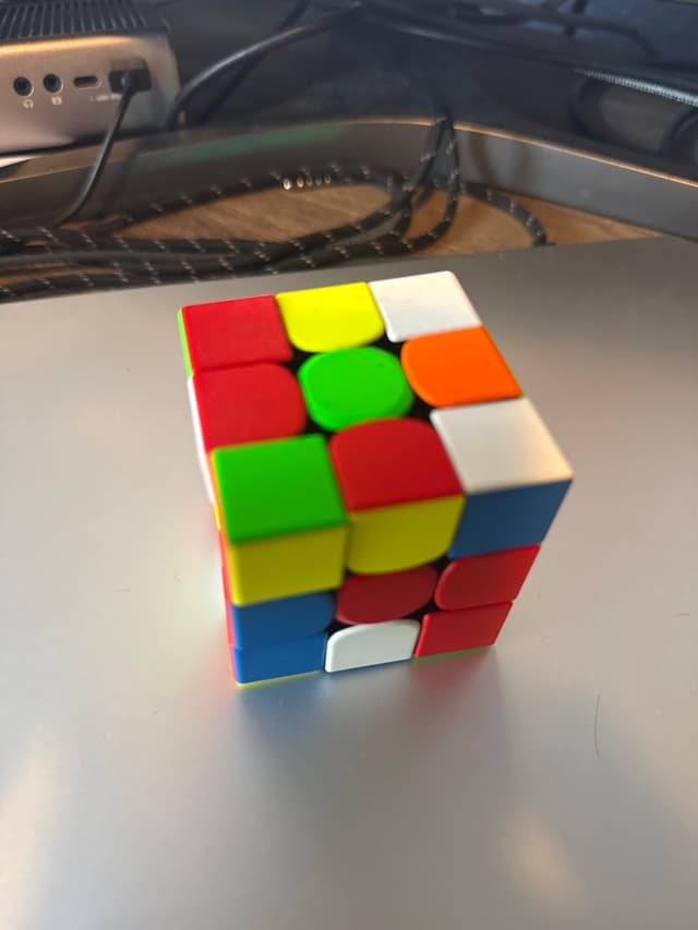3x3 stickerless speed cube (Rubik's Cube-style twist puzzle) - AI says Real