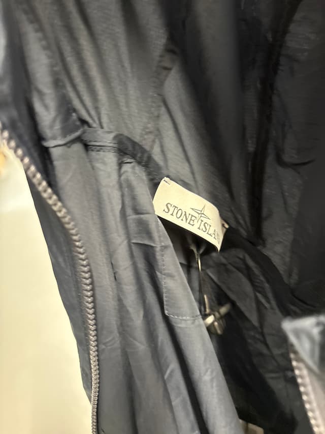 Stone Island navy nylon zip jacket - AI says Real